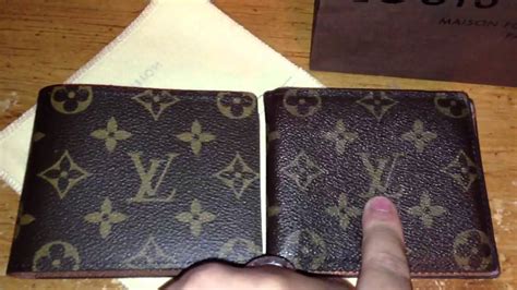 gucci vs louis vuitton mens wallet|difference between gucci and vuitton.